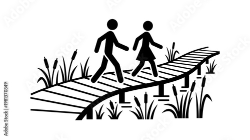 People Walking on a Boardwalk Through Marshland