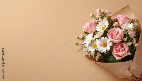 Beautiful Bouquet of Pink Roses and Daisies on a Beige Background.