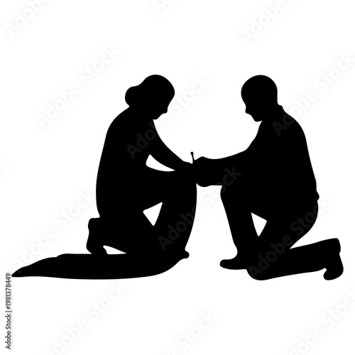 Silhouette of a proposal with a ring.