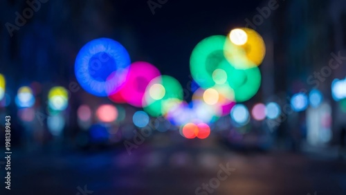 Bokeh city lights in vibrant colors at night with festive, and blurred atmosphere.