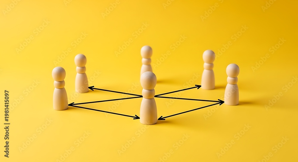 Obraz premium Wooden figurines with connecting arrows on yellow background, symbolizing teamwork