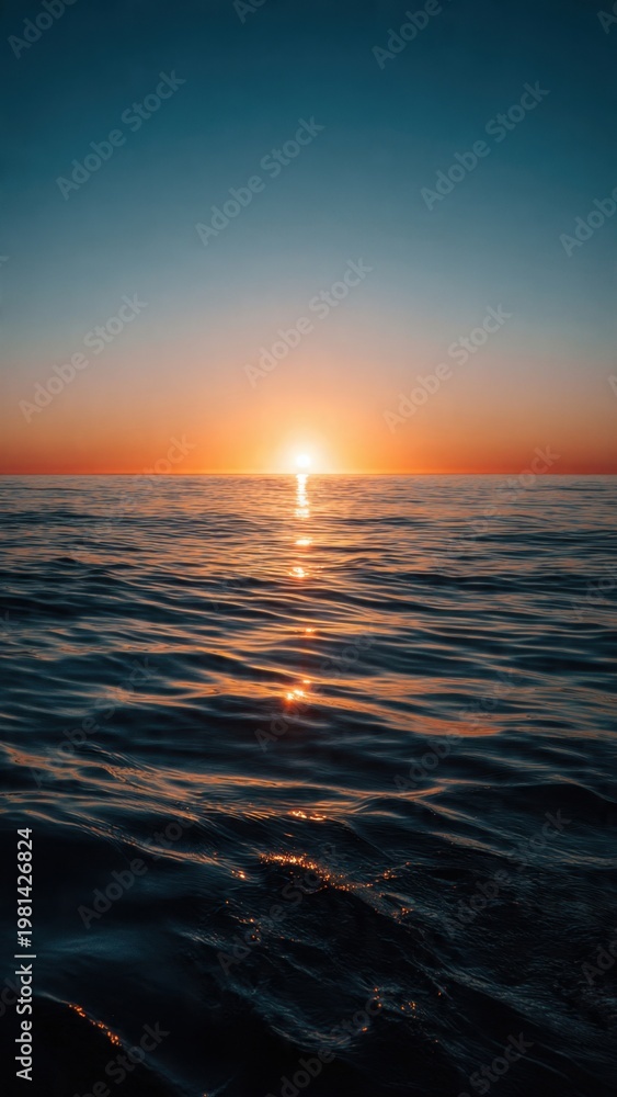 Fototapeta premium Sunset Over Calm Ocean Horizon