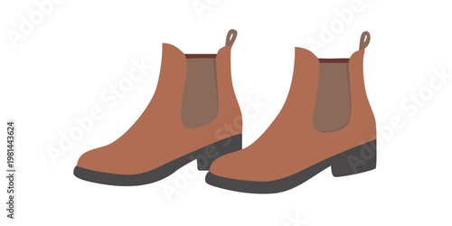 A pair of orange brown ankle boots with low heels are displayed