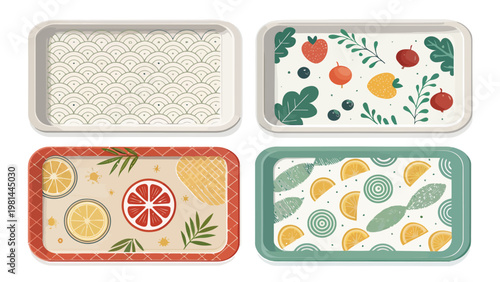 Four rectangular trays with various fruit patterns and designs on white background