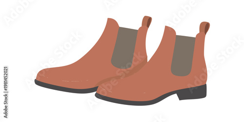 A pair of orange ankle high boots with dark gray soles are displayed