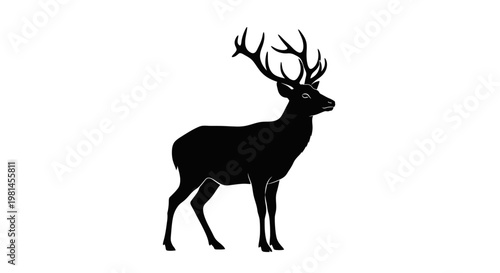Deer with large antlers standing still.