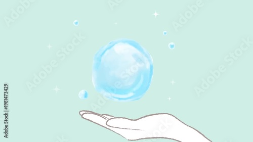 手のひらに浮かぶ水の球体とキラキラ光っている光