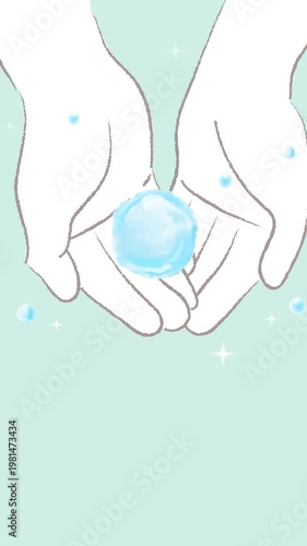 手のひらに浮かぶ水の球体とキラキラ光っている光