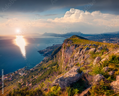 Fantastic morning view of national park Orientata Pizzo Cane and Bagheria town on background, Pizzo Trigna e Grotta Mazzamuto location. Nice summer sunrise on Sicily, Italy. 