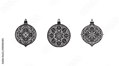 Black and white Christmas ornaments with intricate designs hanging from a loop  three baubles with floral patterns