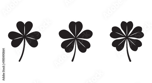 Three black clover leaf silhouettes with stems on white background  cloverleaf shapes with rounded hearts