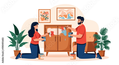 Happy couple working together to renovate their home by painting an old wooden cabinet with blue and red colors.