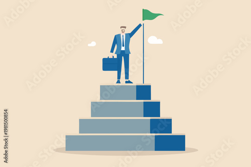 Businessman celebrates success atop a staircase with a green victory flag