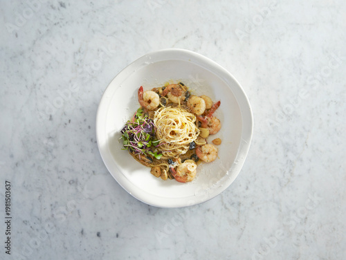 Shrimp garlic oil pasta on a plate
