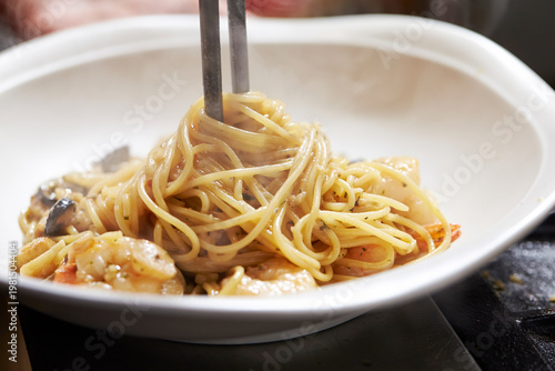 Shrimp garlic oil pasta on a plate
