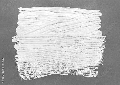 white strokes of paint roller on dark grey background. high-detailed texture.