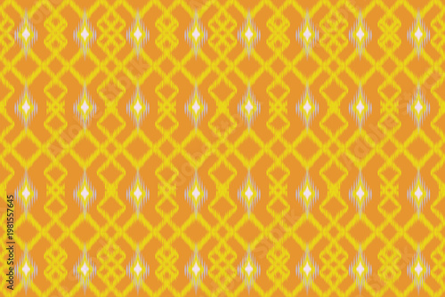 Bright Ikat pattern in vibrant yellow and orange tones featuring repeating geometric diamond shapes and linear motifs.