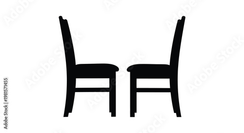 Two black chairs face each other on a plain white background