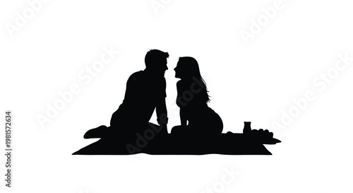 Silhouette of a couple on a picnic facing each other intimately