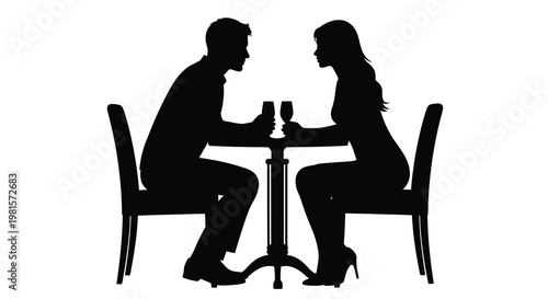 Silhouette of a couple enjoying a romantic dinner together
