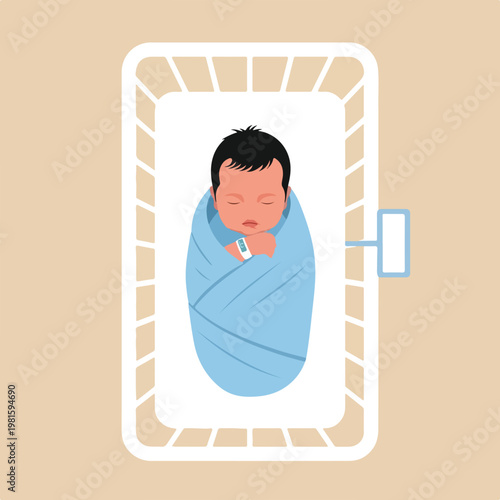 Newborn baby with dark hair sleeps swaddled in a blue blanket in a hospital crib