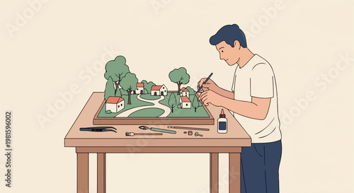 Young man crafting a detailed miniature landscape model on a wooden workbench