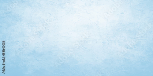 An abstract blue grunge background with a textured vintage paper pattern features a rough aged surface and light paint material for a retro wall design