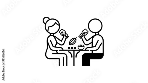 Couple Enjoying Wine and Food at a Table