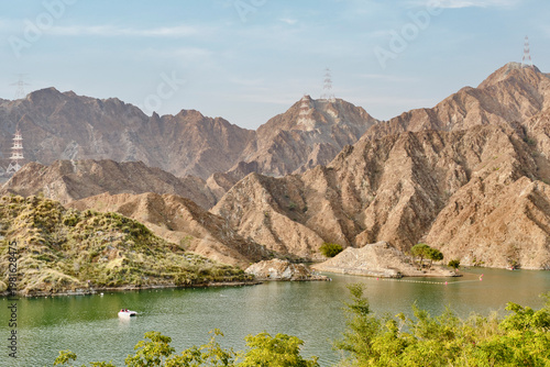 Scenic view of Al Rafisah Dam reservoir and Hajar Mountains in Sharjah UAE
