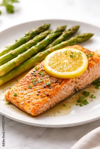 Baked salmon with asparagus and lemon wedges bright healthy meal top view food photography