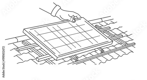 Hand placing solar panel on roof.