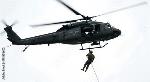 Soldier Fast Roping from a Military Helicopter during a Tactical Operation
