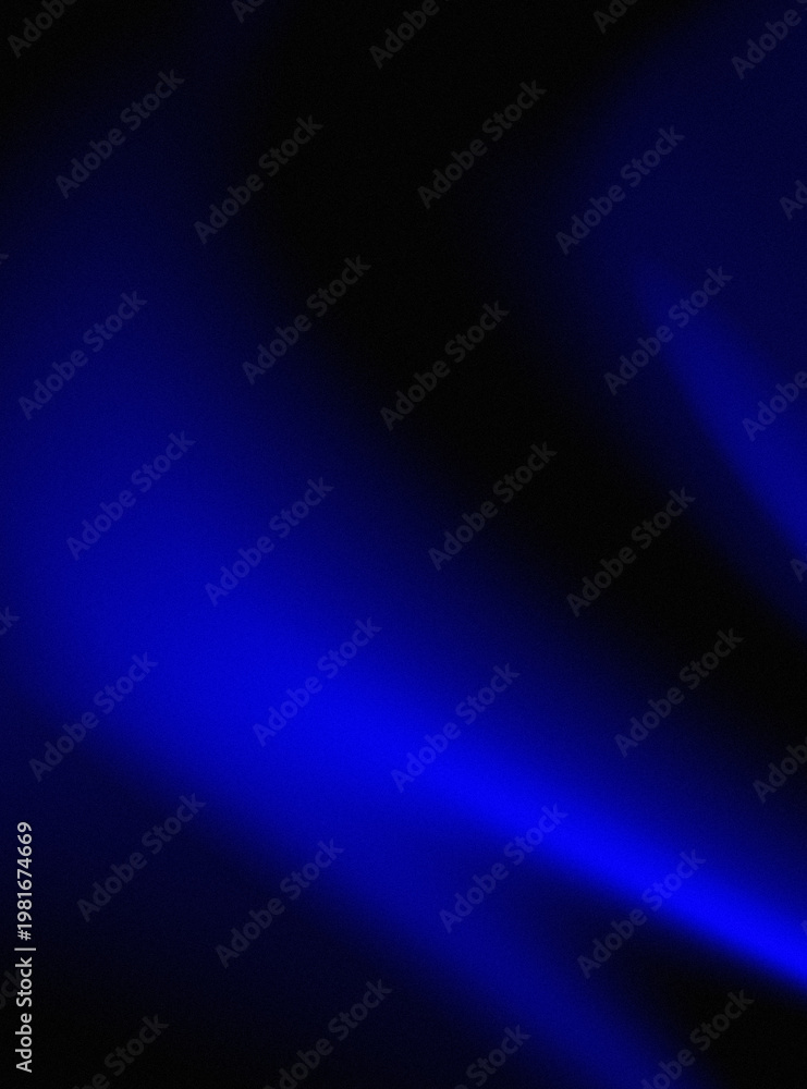 Obraz premium Vibrant blue light beam on a dark background with glowing effect