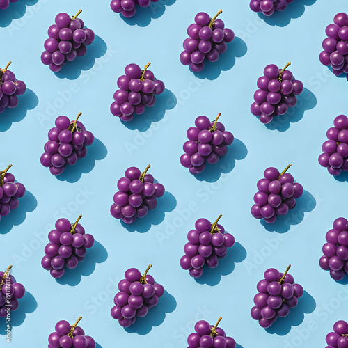 A Pattern Of Bright Purple Grapes On A Solid Light Background