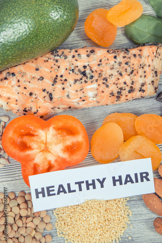 Various nutritious products or ingredients containing vitamins and minerals for healthy and lush hair