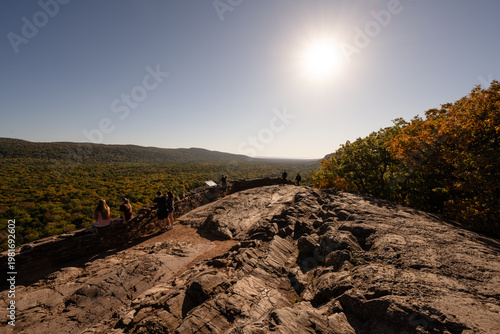 People hiking enjoying Lake of the Clouds overlook Porcupine Mountains