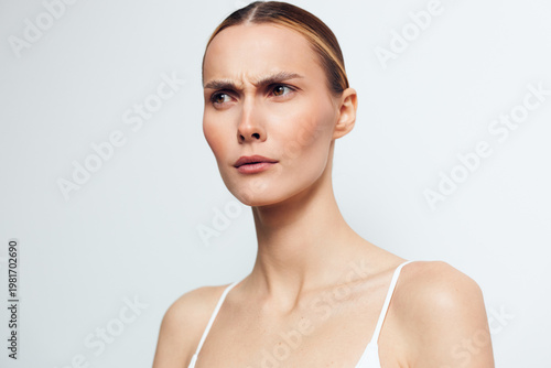 Woman portrait skincare beauty face spa wellbeing smooth skin closeup, gentle moisturiser routine, calm expression, soft studio light on clean background, wellness and self care concept