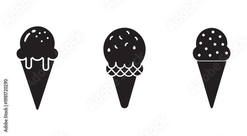 Three black and white ice cream cones with different toppings and designs  isolated on white background
