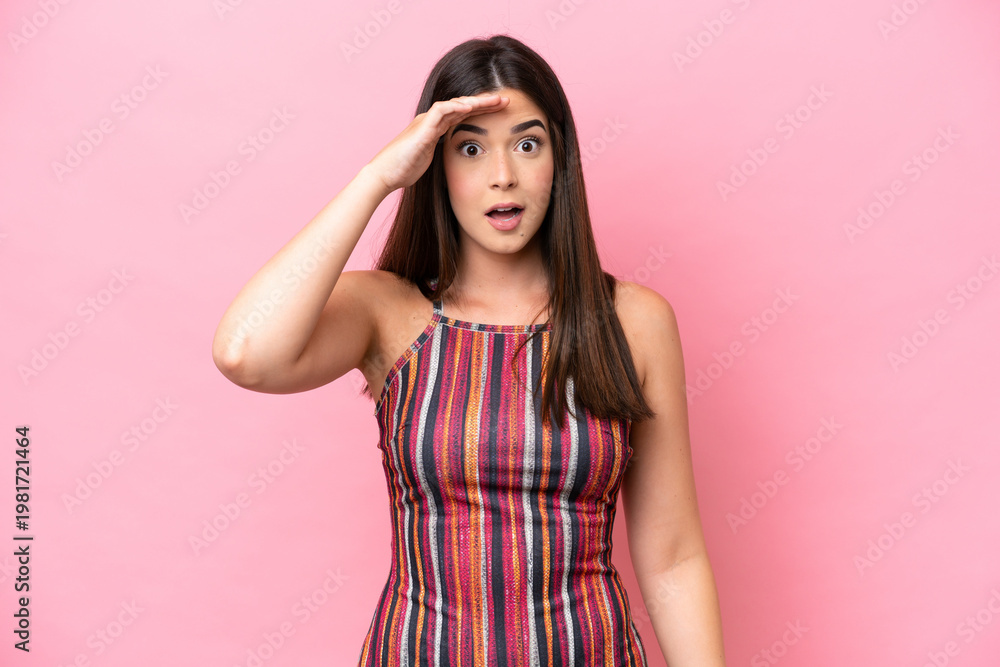 Fototapeta premium Young Brazilian woman isolated on pink background has realized something and intending the solution