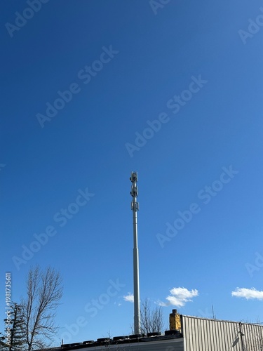 5G cellular tower with antennas and equipment showing wireless communication infrastructure and mobile network technology
