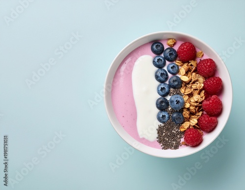 Berry Delight: A visually appealing and healthful berry smoothie bowl, filled with a vibrant blend of fresh berries, creamy yogurt, and crunchy granola. 