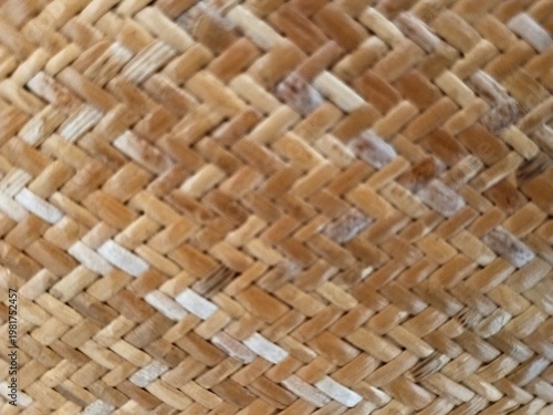 Handmade rattan woven mat texture background, traditional crafts
