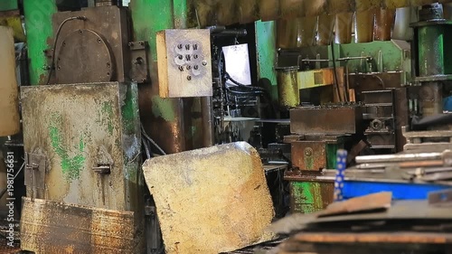 Mechanical equipment in operation inside the steel plant workshop