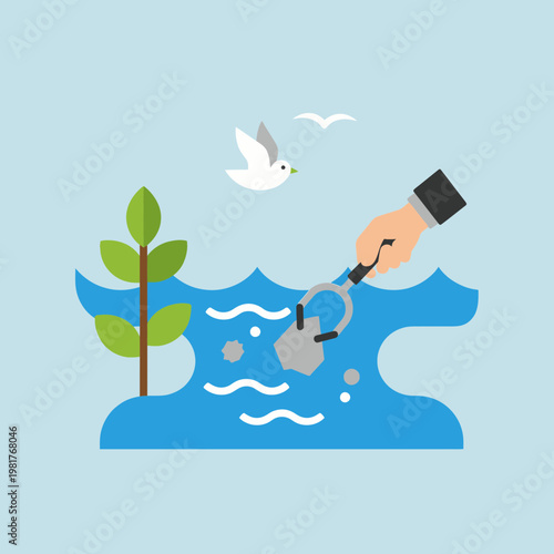 Hand watering green plant with spray bottle.