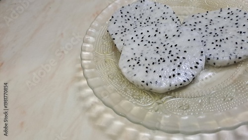 Dragon fruit slices on plate 