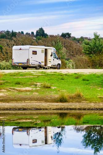 Camper rv camping at lake shore. Alentejo Portugal.