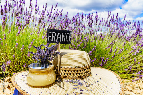 Jar with honey at lavender field. Holidays in France.