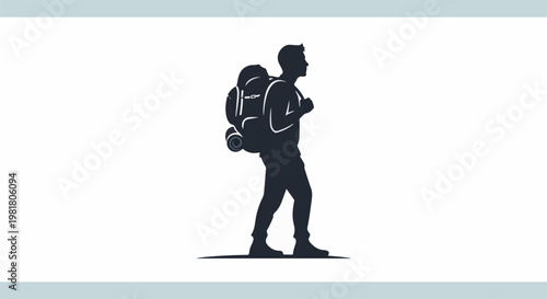 Silhouette of a person with a large backpack hiking