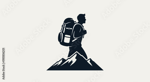 Silhouette of a person with backpack atop mountains