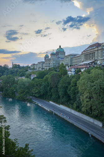 River embankment and city buildings